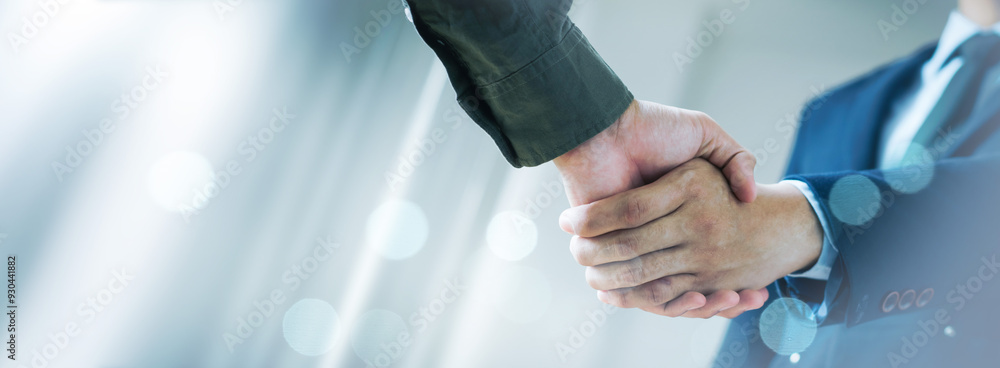 Trusted partner. Businessmen making handshake with partner, greeting, dealing, merger and acquisition, business cooperation concept, joint venture, Build trust in business and finance relationships. Trusted partner. Businessmen making handshake with partner, greeting, dealing, merger and acquisition, business cooperation concept, joint venture, Build trust in business and finance relationships.