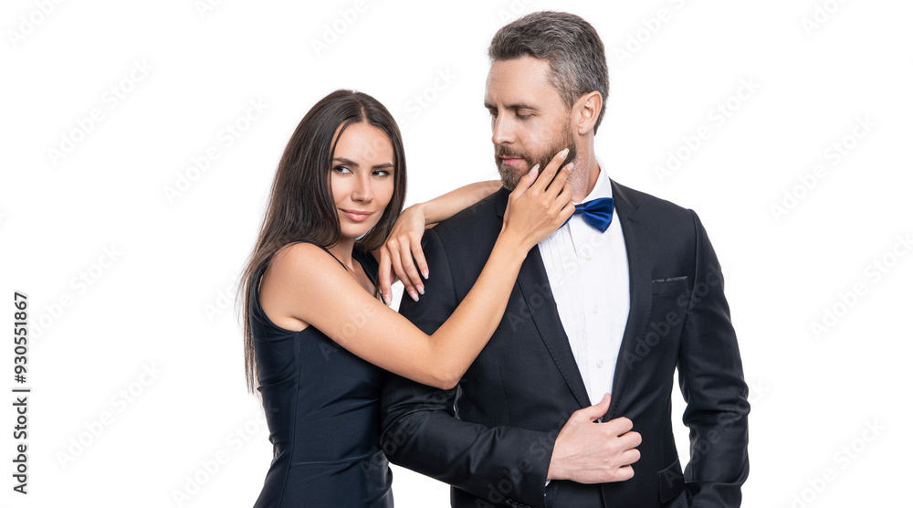 Woman in dress and man in suit with bowtie. Elegant couple isolated on white. Romantic couple spending time together. Two of man and woman on valentines day. Lovely couple dating. Debonair people Woman in dress and man in suit with bowtie. Elegant couple isolated on white. Romantic couple spending time together. Two of man and woman on valentines day. Lovely couple dating. Debonair people