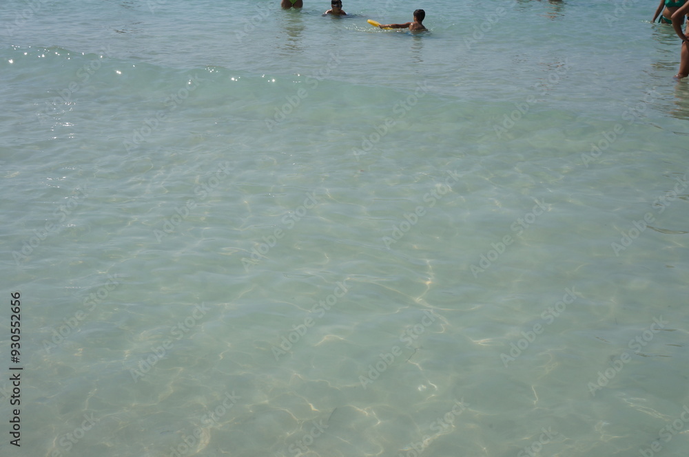 Fototapeta premium people walking on the beach