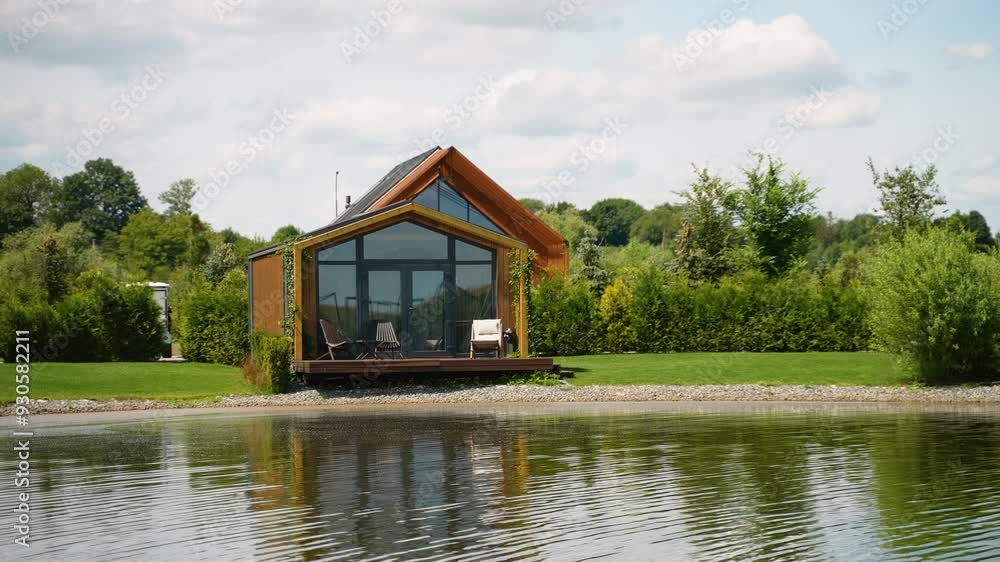Prefabricated mobile modular container house outdoor near the lake and golf course Prefabricated mobile modular container house outdoor near the lake and golf course