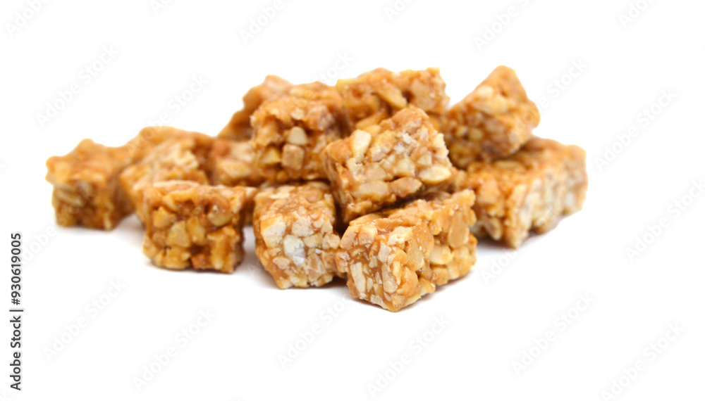 Honey bars with peanuts, sesame and sunflower seeds isolated Honey bars with peanuts, sesame and sunflower seeds isolated