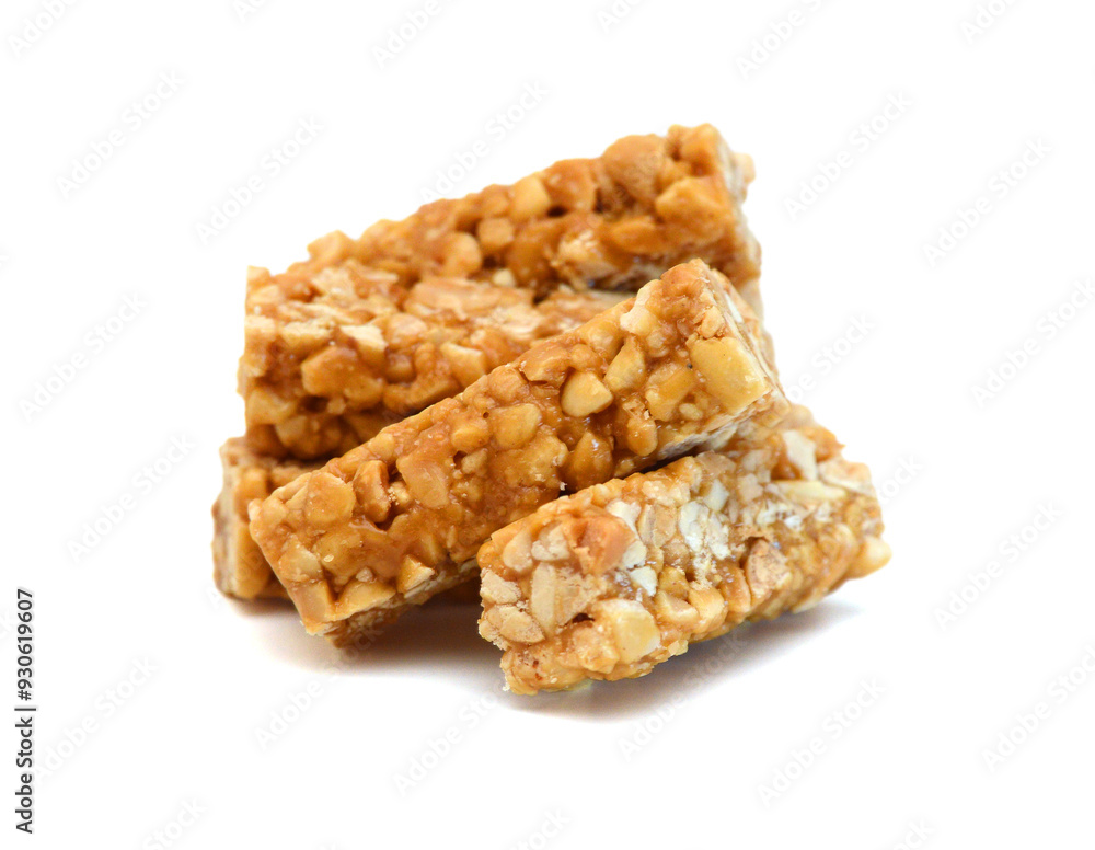Honey bars with peanuts, sesame and sunflower seeds isolated Honey bars with peanuts, sesame and sunflower seeds isolated