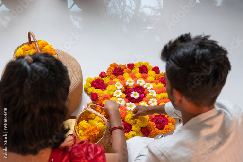 Making Flower decoration for Onam festival, Kerala traditional festival concept image