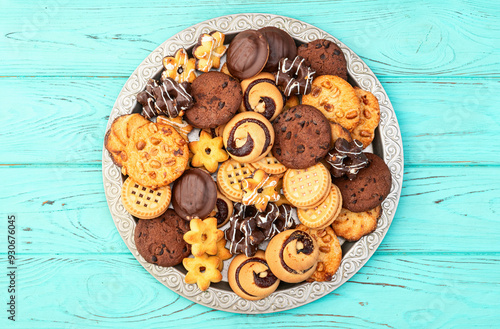 Mix of cookies . Many unhealthy snacks . Top view photo