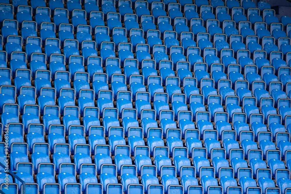 Fototapeta premium Empty seats for fans at a football stadium