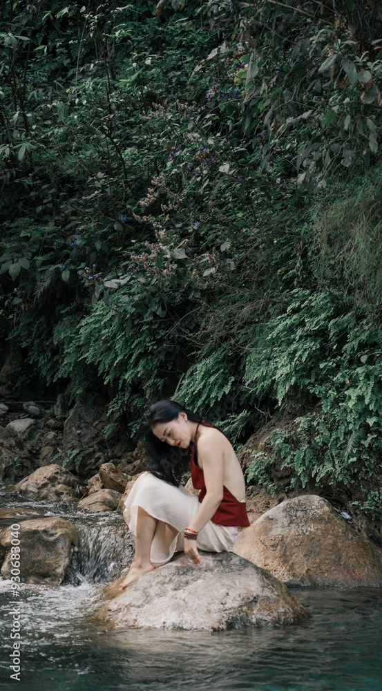 Secret Waterfall. An Asian girl against the backdrop of the tropics.High quality photo Secret Waterfall. An Asian girl against the backdrop of the tropics.High quality photo