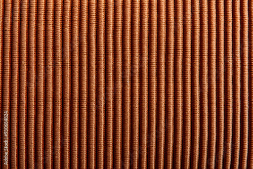 Close-up of a braided hemp rug emphasizing its natural texture and design.