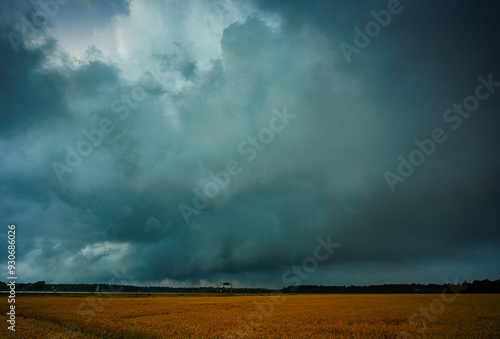 Tornadic storm clouds over the field, creating threatening atmosphere in countryside