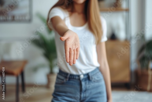 Crop close up of young Caucasian woman stretch hand get acquainted greeting with client or customer at meeting. Female employee handshake welcoming newcomer newbie. Acquaintance concept photo