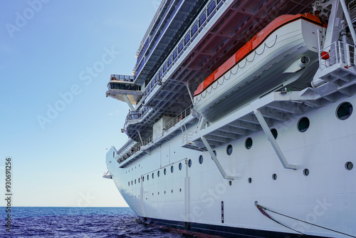 Fragment of the front part of a large modern luxury cruise ship, view from sea level