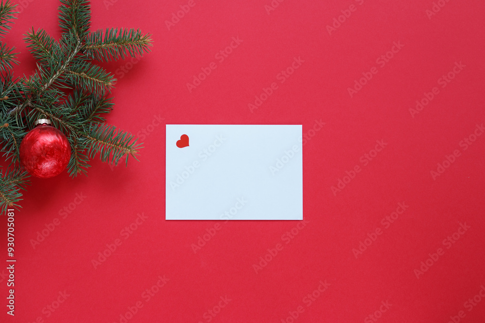 Christmas card with heart, with red ornament and pine branch. Christmas card with heart, with red ornament and pine branch.