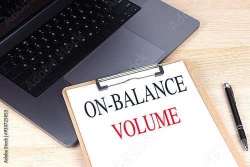 ON BALANCE VOLUME text on clipboard on laptop