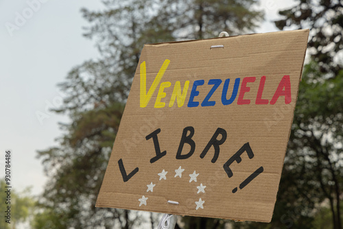 Venezuela opposition, People protest against presidential election results, holding banner signs on city streets. Democracy and activism