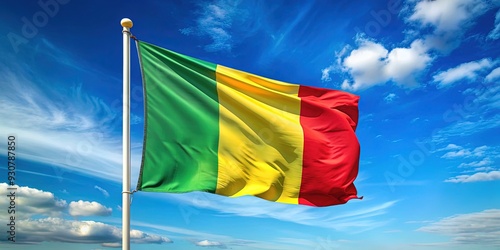 Vibrant Mali flag waving in the wind against a clear blue sky, with intricate patterns and colors symbolizing the West African country's rich culture and heritage. photo