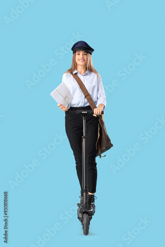 Young postwoman with letter...