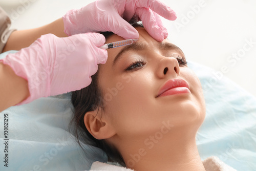 Beautician giving injection...