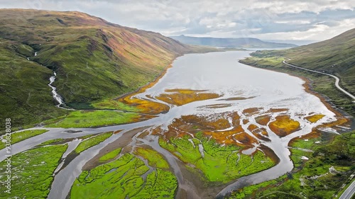 Aerial view of the Black Cuillin mountains, Isle of Skye, Scotland. Scenic view of Scottish Highlands Sligachan Old Bridge and river in the United Kingdom. photo