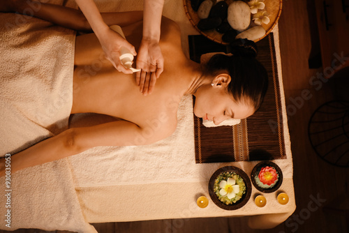 Young woman getting massage...
