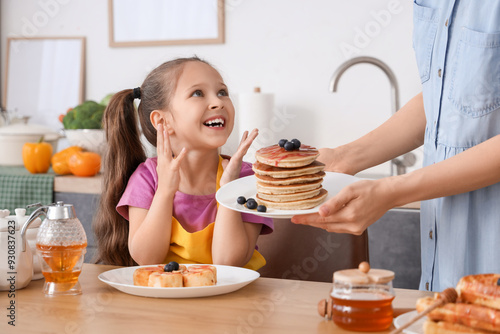 Cute little girl receiving ...
