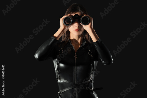 Female spy looking through ...