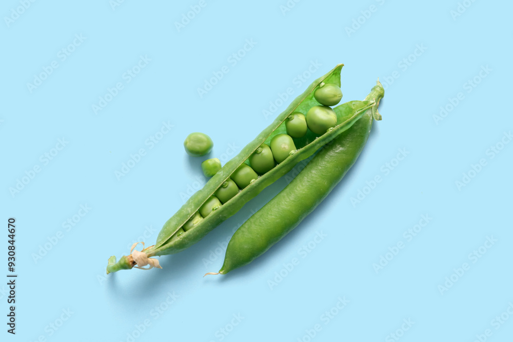 Green peas on blue background Green peas on blue background