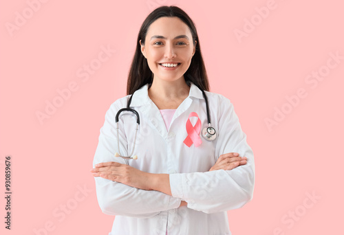Female doctor with pink rib...