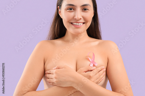 Naked young woman with pink...