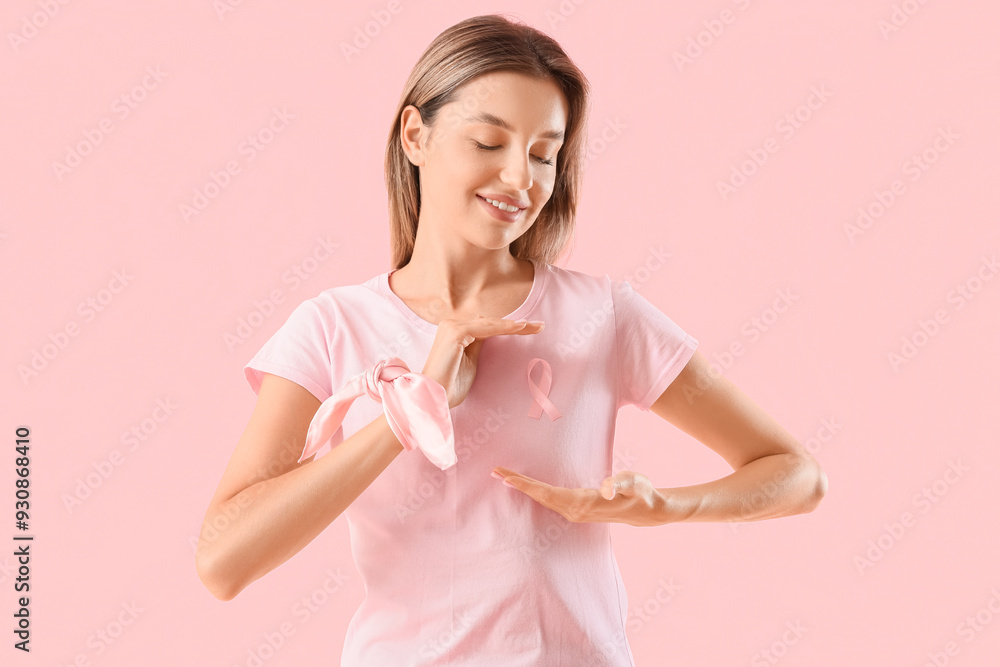 Young woman with pink ribbon on color background. Breast cancer awareness concept Young woman with pink ribbon on color background. Breast cancer awareness concept