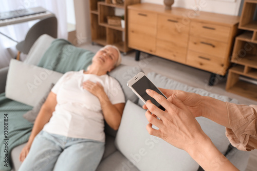 Woman with mobile phone and...