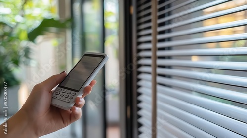 Blinds being controlled by a remote photo