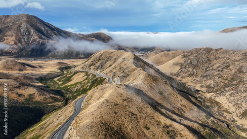 Aerial view of the mountains shrouded in cloud in Torlesse Tussocklands Park photo