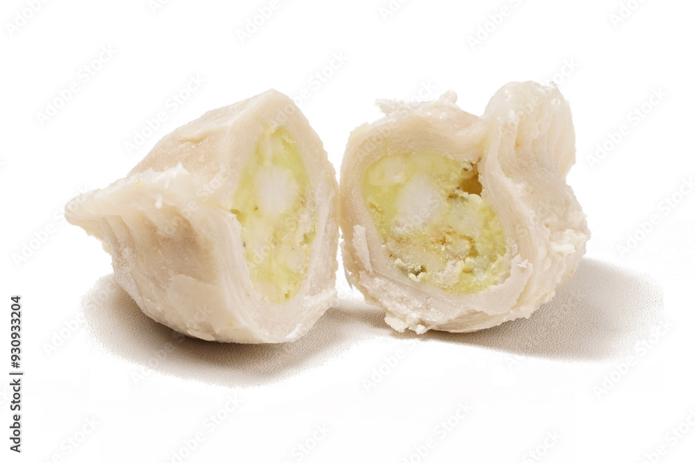 Frozen stuffed Cireng, a traditional Indonesian snack ready to fry, filled with seasoned beef fat or koyor, photographed against a white background. Frozen stuffed Cireng, a traditional Indonesian snack ready to fry, filled with seasoned beef fat or koyor, photographed against a white background.