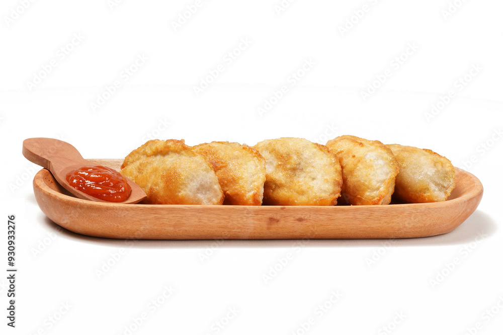 Fried stuffed Cireng, a traditional Indonesian snack filled with seasoned beef fat or jando, perfect with chili sauce dip, photographed against a white background. Fried stuffed Cireng, a traditional Indonesian snack filled with seasoned beef fat or jando, perfect with chili sauce dip, photographed against a white background.