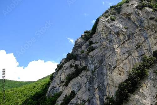 Picturesque view of rocky cliff in mountains