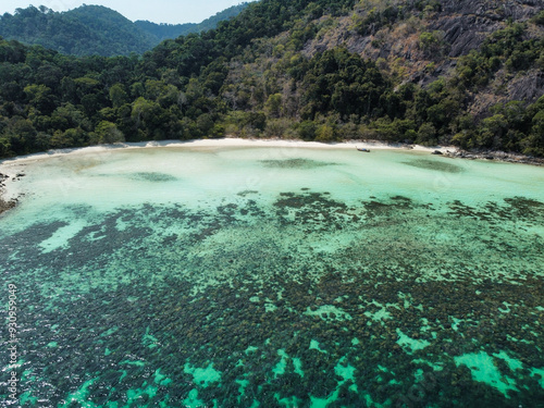 Aerial view of Ko Ra Wi at low tide with coral reef, turquoise water and white sand beach; this remote island is part of the Tarutao national park and marine reserve, Satun, Thailand photo