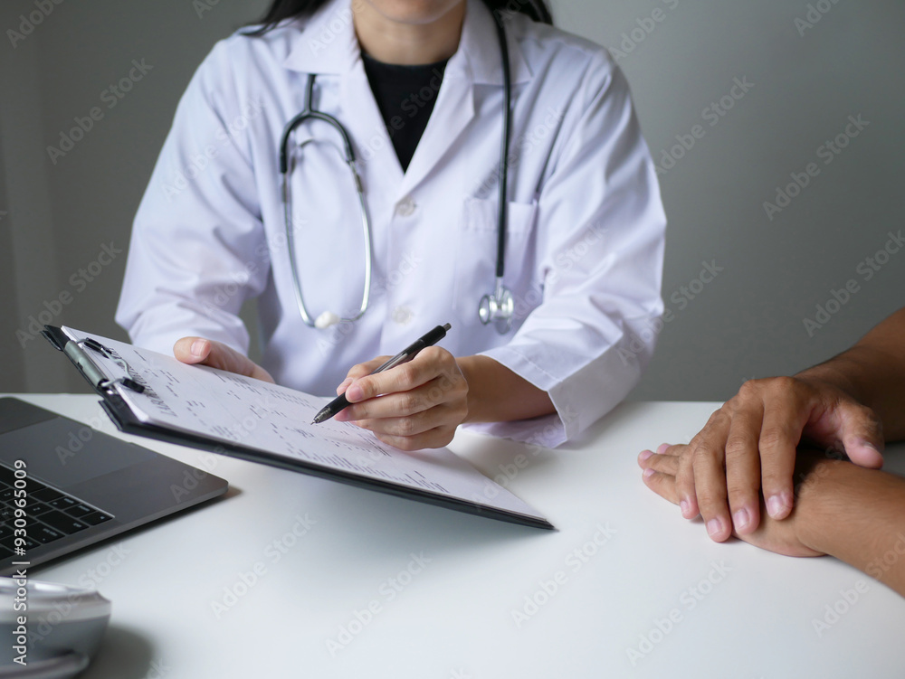 Asian female doctor explains medical information and diagnoses disease Treat patients, make appointments to listen to results after physical examination. Medical and wellness concept