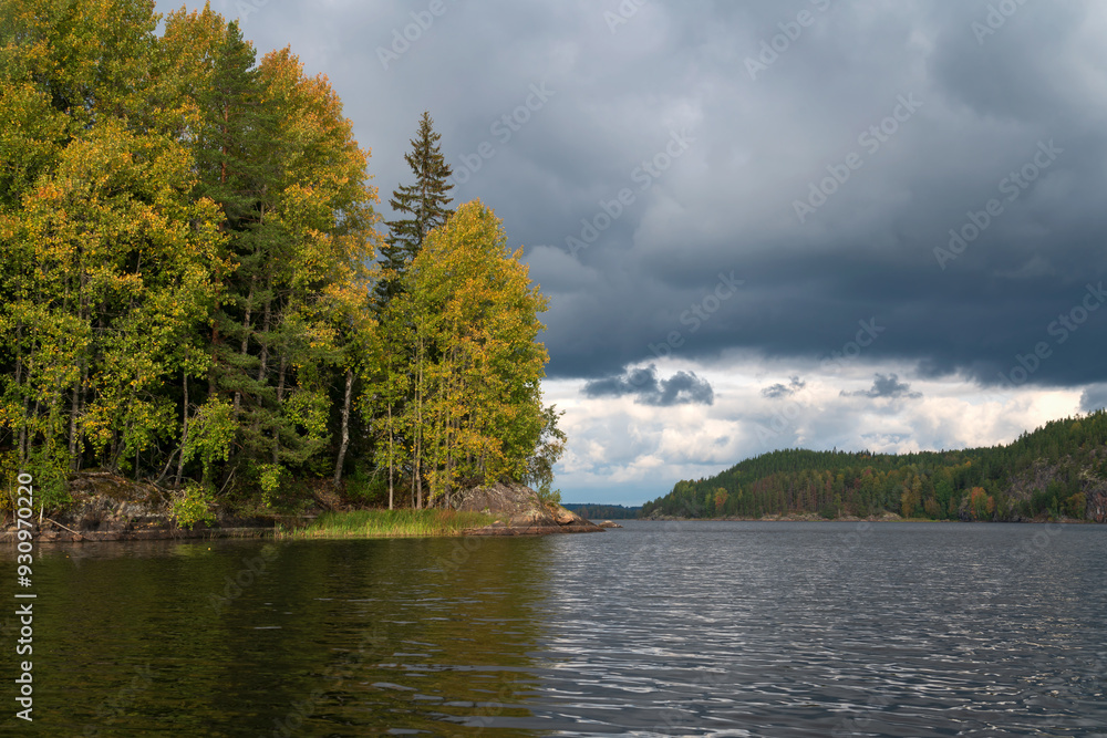 Lake Ladoga near the village Lumivaara on a sunny autumn day, Ladoga skerries, Lakhdenpokhya, Republic of Karelia, Russia Lake Ladoga near the village Lumivaara on a sunny autumn day, Ladoga skerries, Lakhdenpokhya, Republic of Karelia, Russia