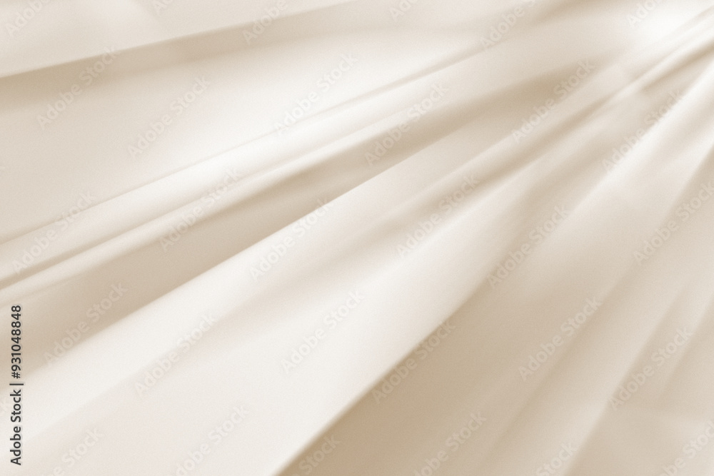 Obraz premium 光り輝く絹のような明るいベージュのドレープ背景。上品で豪華な雰囲気のテクスチャ