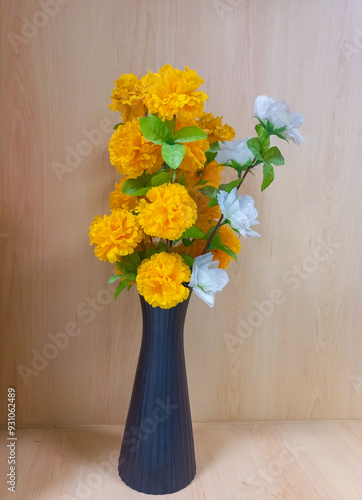 Beauty Flowers in  black ceramic vase.