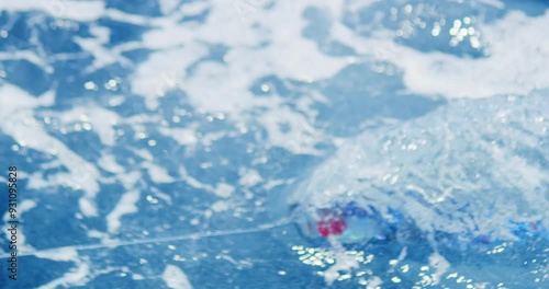 Top down view of fishing lure pulling through water