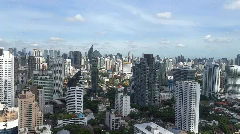 Aerial view of downtown skyscrapers. Cinematic drone shot of city skyline. Urban metropolis, high-rise modern architecture buildings. Big city buildings. Bangkok, Thailand. Aerial view of downtown skyscrapers. Cinematic drone shot of city skyline. Urban metropolis, high-rise modern architecture buildings. Big city buildings. Bangkok, Thailand.