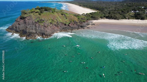 Aerial View Of Surfers At Cabarita Beach Near Norries Headland Hills In Northeastern New South Wales, Australia. photo