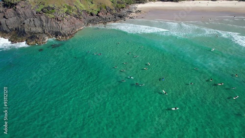 Tourists With Surfing Boards At Cabarita Beach Near Norries Headland In New South Wales, Australia. Aerial Drone Shot photo