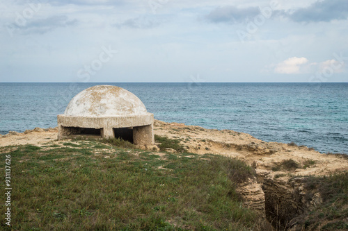 Un piccolo bunker della seconda guerra mondiale sulla costa prima di San Foca, borgo marinaro lungo il Cammino del Salento che da Lecce porta a Santa Maria di Leuca photo