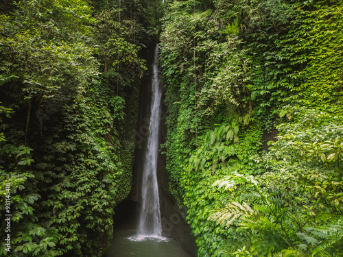 Fototapeta Naklejka Na Ścianę i Meble -  Aerial drone view of Leke leke waterfall in Tabanan, Bali, Indonesia