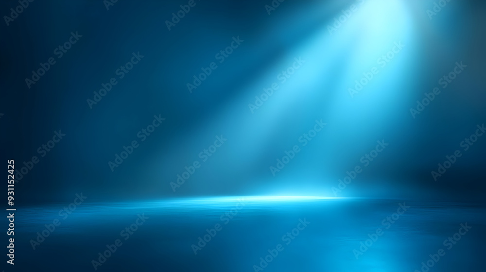 Fototapeta premium A serene blue spotlight illuminating a dark space.