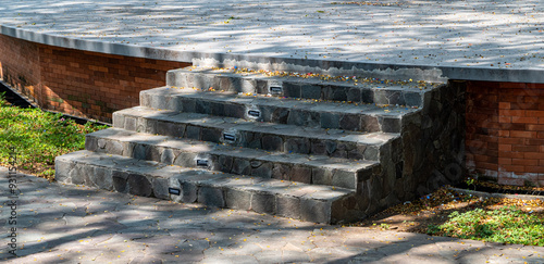 stone stairs to help people climb onto the performance stage