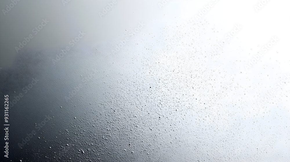 A textured surface with droplets, creating a misty atmosphere. A textured surface with droplets, creating a misty atmosphere.