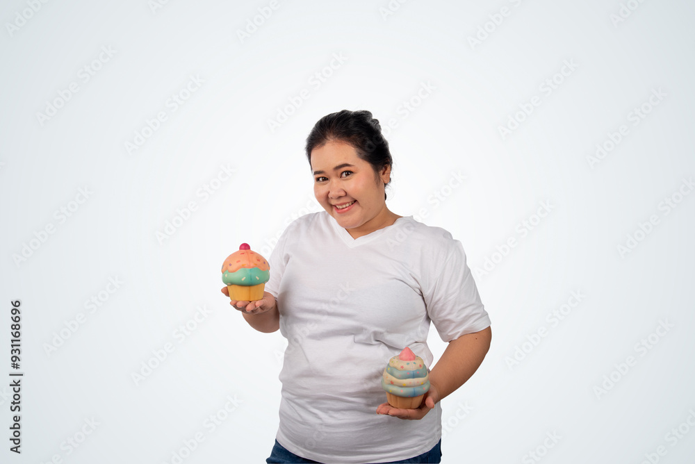 Portrait of happy young plus size woman, holding a mock up ice cream and smiling on white isolated background,can be use as a visual to communicate for consumption of junk food. Portrait of happy young plus size woman, holding a mock up ice cream and smiling on white isolated background,can be use as a visual to communicate for consumption of junk food.