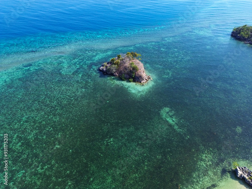 Aerial view of tiny island outside Rangko Cave in Tanjung Boleng, Boleng, West Manggarai Regency, Flores, East Nusa Tenggara, Indonesia photo